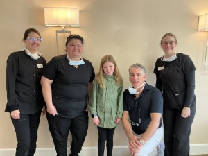 Group staff photo in office