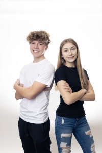 Two teens posing with smiles